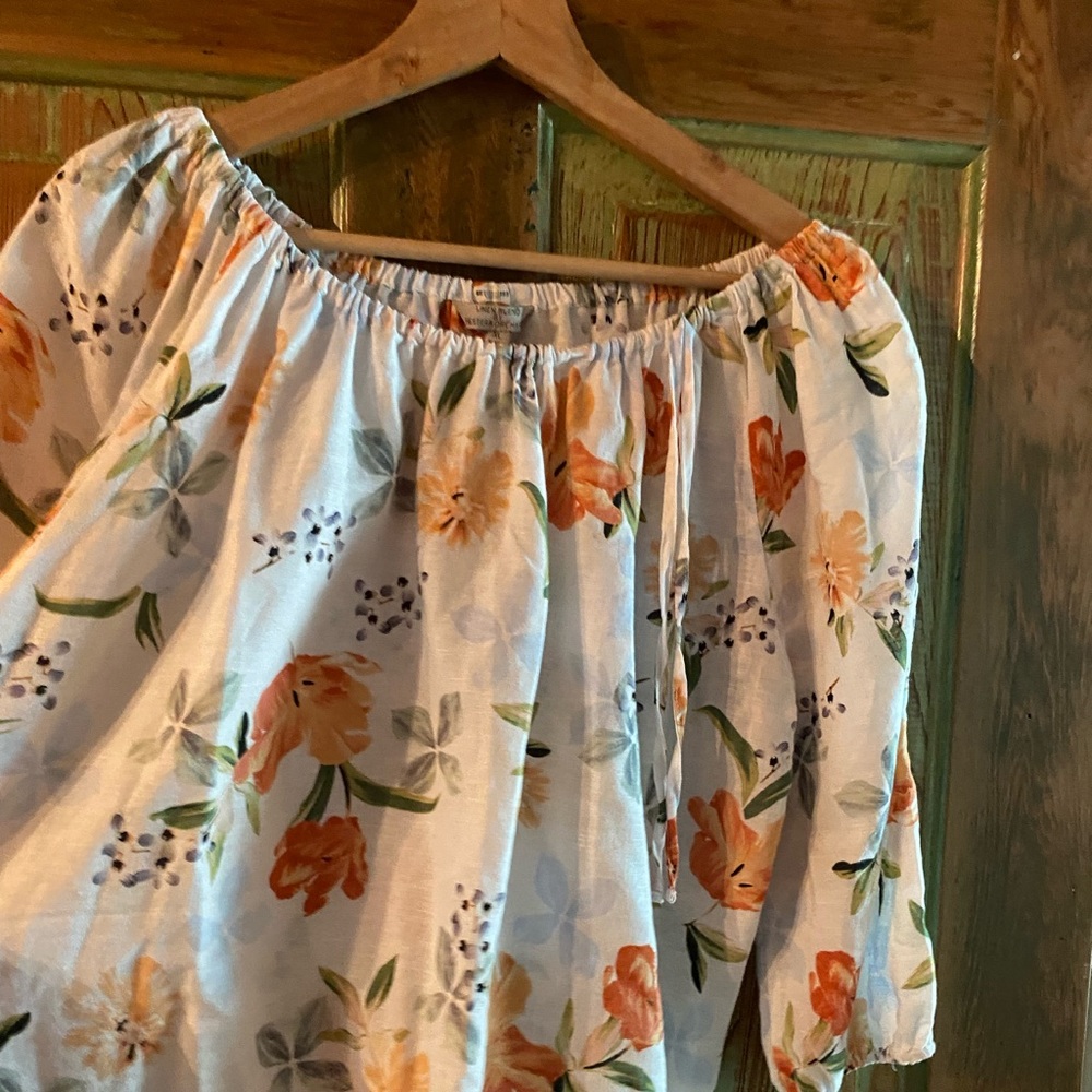 Linen blend blouse size xl but runs small.